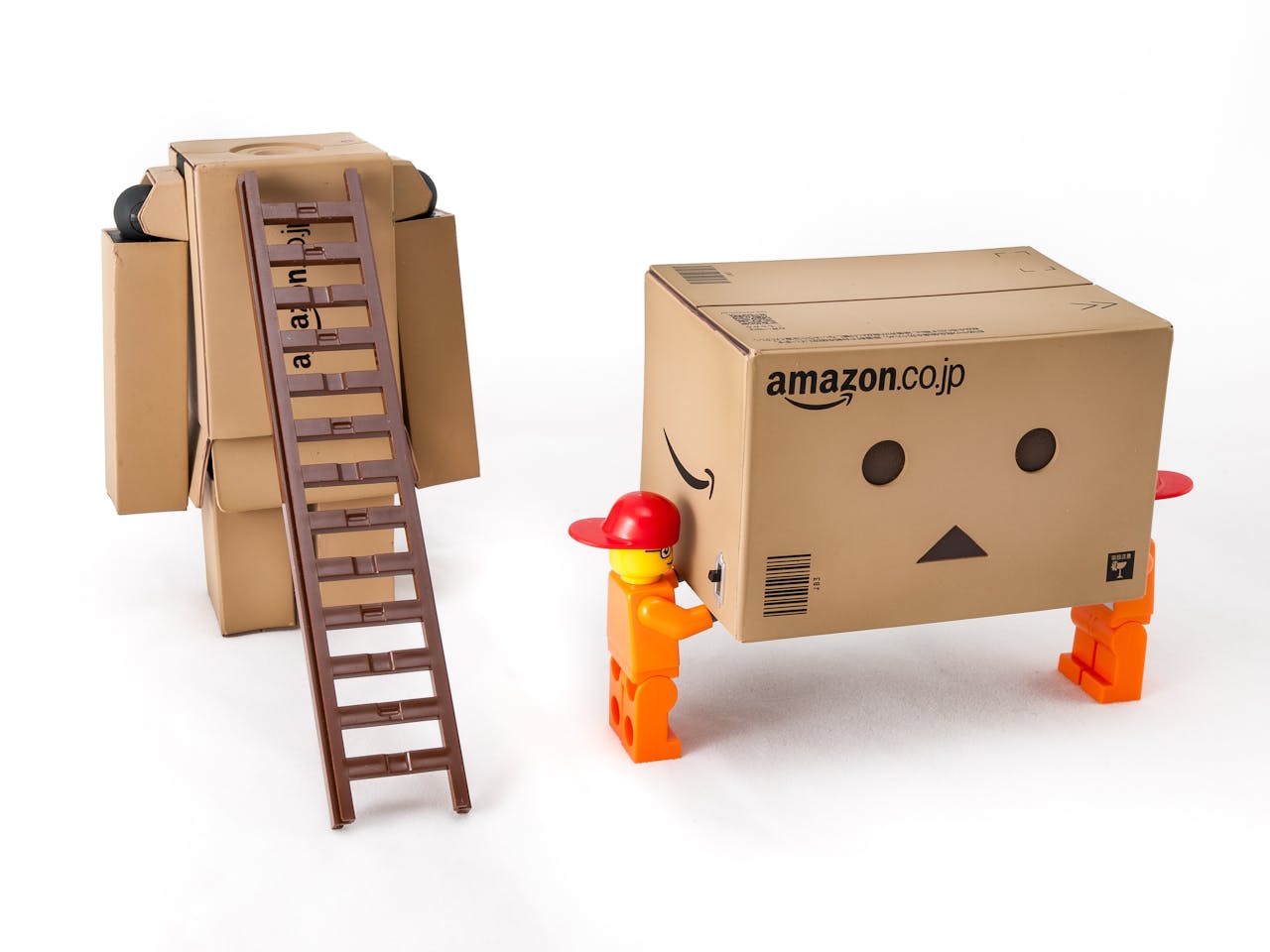 Amazon Cardboard Box and Dolls